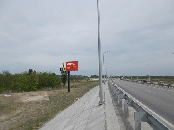 Левобережная-объездная ул. (позиция 24 по ходу движения в сторону Ворошиловского моста), сторона B