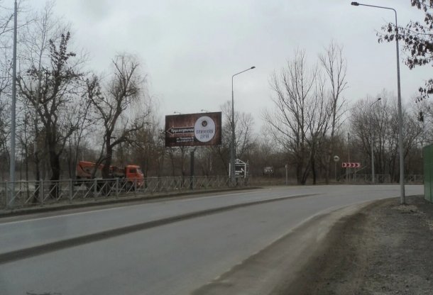 Левобережная-объездная ул. (позиция 9 по ходу движения в сторону Ворошиловского моста), сторона B