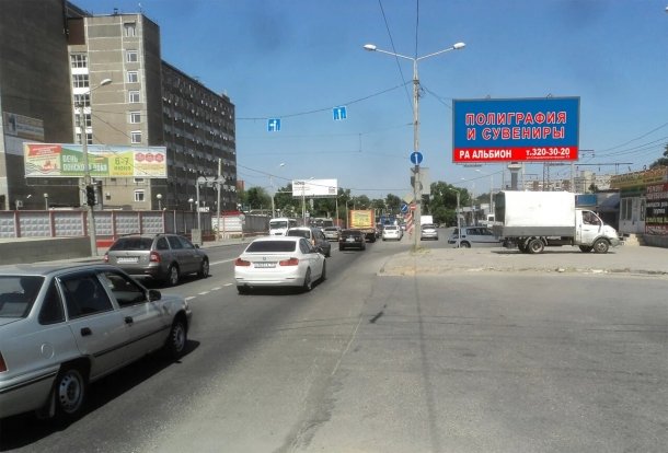 Менжинского ул. 2 (через дорогу в конце дома по ходу движения) - ЗУ Ростсельмаш, сторона A(7)