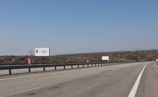 Трасса М-23 (Ростов-Таганрог) 14 км+900 м слева, сторона B