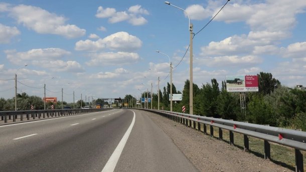 Южный подъезд к г. Ростову-на-Дону 10 км+185 м слева по ходу километража , сторона A