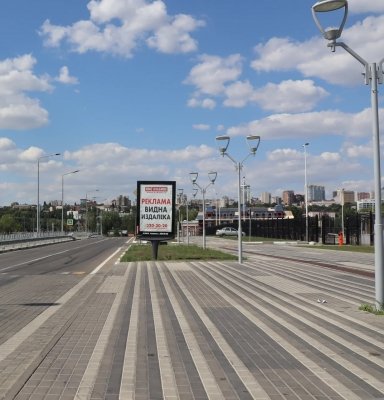 Левобережная ул. (Стадион зап. вход поз. 2 по ходу дв в с-ну моста), сторона A