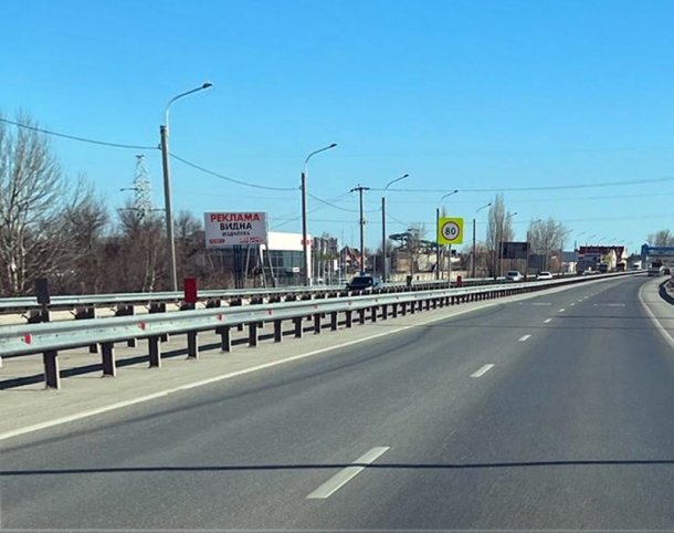 Южный подъезд к г. Ростов-на-Дону 8 км+715 м  слева по ходу километража, сторона B