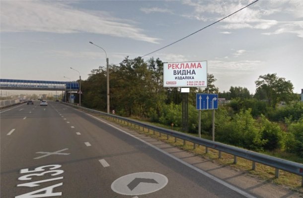Южный подъезд к г. Ростов-на-Дону 11 км + 0 м  слева по ходу километража, сторона A